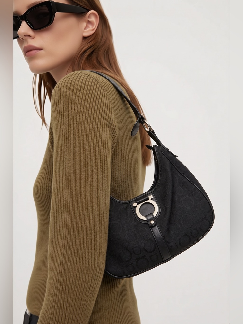Ferragamo Black Women's logo Shoulder Bag. No call outs. Leather accents.